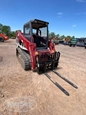 Used Takeuchi in yard
